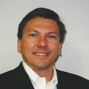 Headshot of Richenderfer who is smiling into the camera.